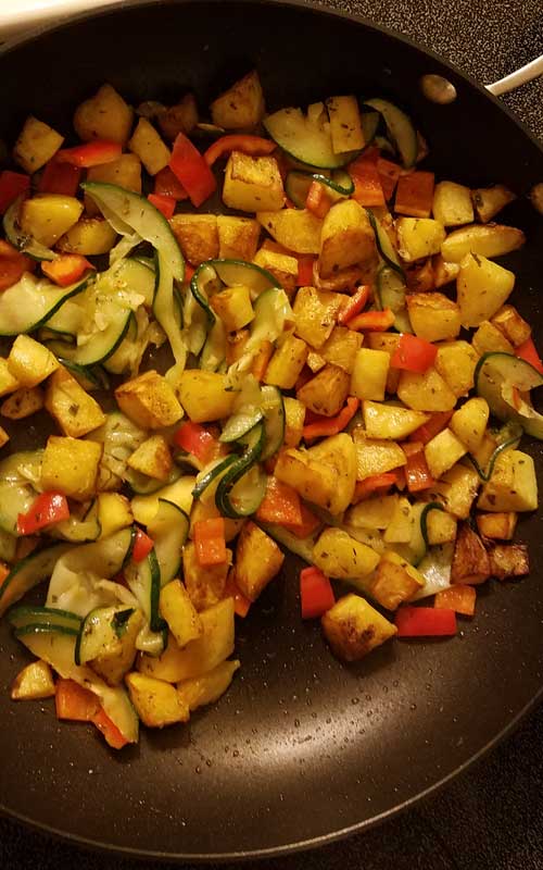 Flavorful pan roasted squash, zucchini, and red bell peppers come together on a bed of linguine, with a simple ricotta and parm cream sauce makes this a winner winner chicken dinner.