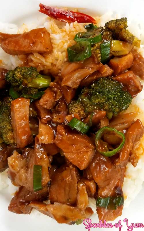 Roast Pork and Garlic Sauce with broccoli and green onions over white rice.