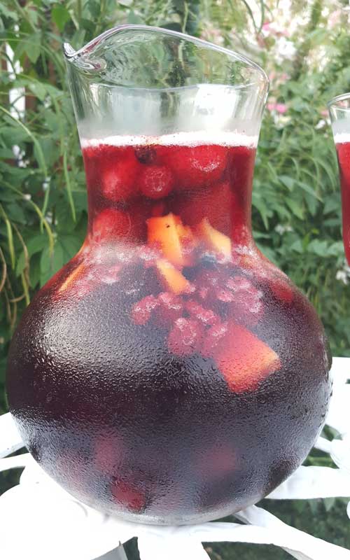 This recipe for Sparkling Mango Berry Sangria is a perfect and super-simple way to celebrate summer, or any day for that matter.