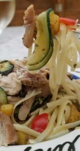 Flavorful pan roasted squash, zucchini, and red bell peppers come together on a bed of linguine, with a simple ricotta and parm cream sauce makes this a winner winner chicken dinner.