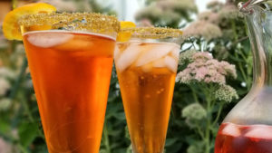 Deliciously simple Hocus Pocus Aperol Fizz with no food coloring only 3 ingredients make this beautiful drink and a little gold sugar is all you need!