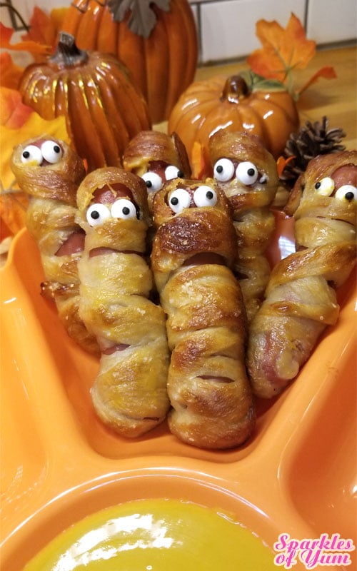 These Pretzel Mummy Dogs are so cute and fun to make, everyone will love them! Part of their charm is in their imperfections!