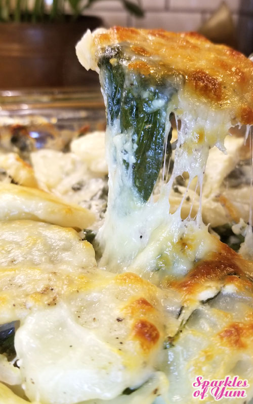 This Spinach and Artichoke Scalloped Potatoes recipe is absolutely delish! So creamy and cheesy. This takes scalloped potatoes to a whole new level.