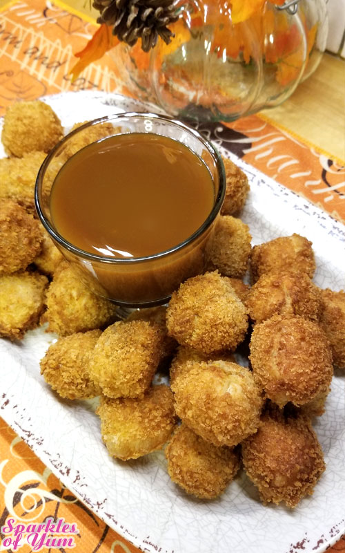 Insanely delicious little bites of crunchy on the outside, a soft flaky layer, and then all the pumpkin pie goodness on the inside dipped in caramel sauce.