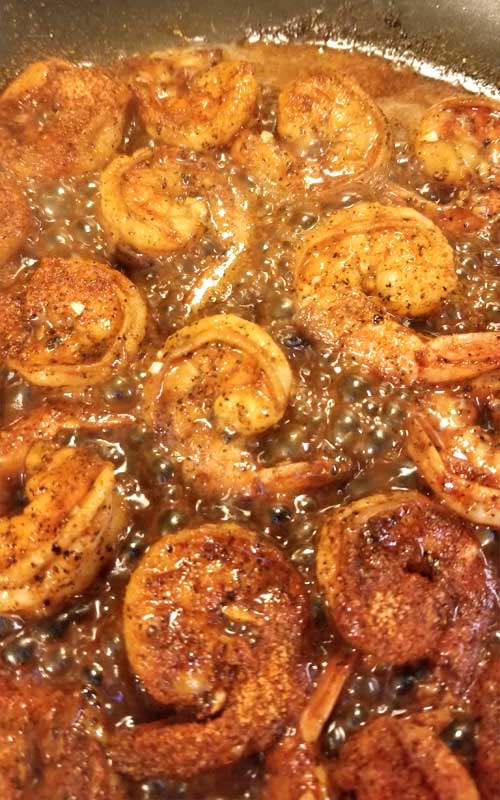 Indulge away with this buttery, creamy, spicy New Orleans Barbeque Shrimp, that has nothing to do with a grill by the way. They do things their own way in New Orleans, and that way is the tasty way!