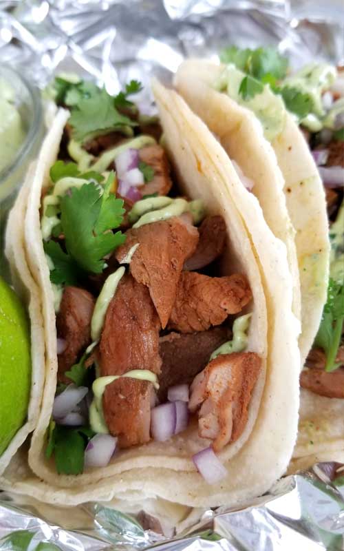 Carne Adovada Street Tacos Recipe - Looks like a misspelling of Avocado, it's not. This is what it's called, and it's the most tender, moist and flavorful Pork Tacos we've ever had! We also made an awesome Creamy Avocado Cilantro Lime Dressing to top it off with.