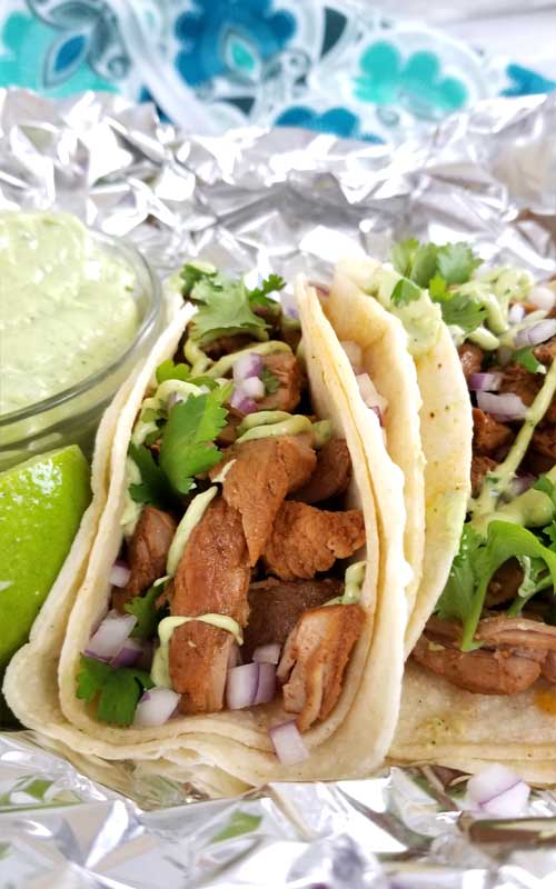 Carne Adovada Street Tacos Recipe - Looks like a misspelling of Avocado, it's not. This is what it's called, and it's the most tender, moist and flavorful Pork Tacos we've ever had! We also made an awesome Creamy Avocado Cilantro Lime Dressing to top it off with.