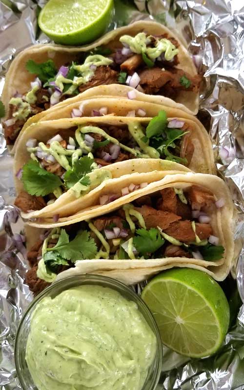 Carne Adovada Street Tacos Recipe - Looks like a misspelling of Avocado, it's not. This is what it's called, and it's the most tender, moist and flavorful Pork Tacos we've ever had! We also made an awesome Creamy Avocado Cilantro Lime Dressing to top it off with.