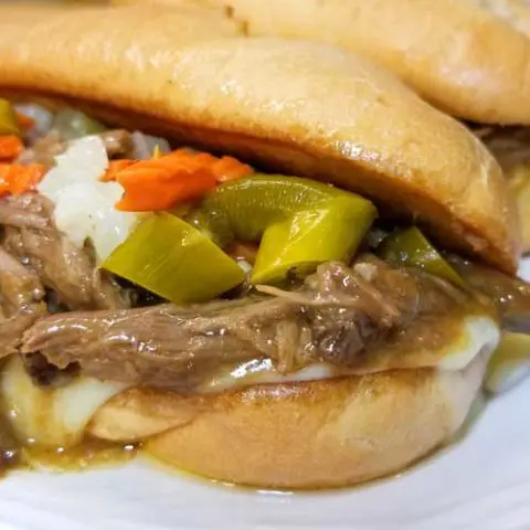 Slathered with luscious garlic butter, ooey-gooey provolone cheese, a bit of tang from the giardiniera, and the rich flavors of the roast beef. THIS Italian Roast Beef Sandwich is one of my all time favorite sandwiches!