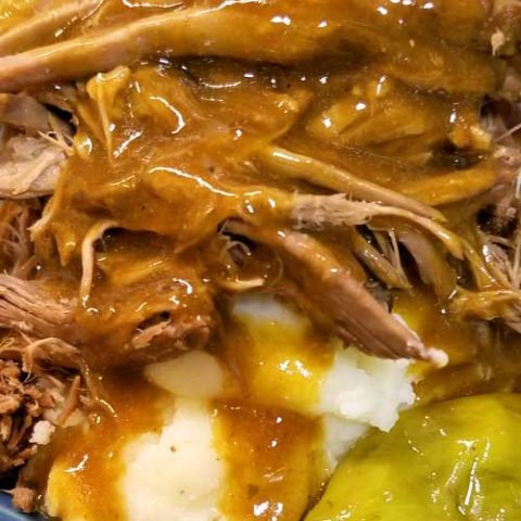 An easy peasy gravy makes a silky, scrumptious, and divine addition to this fork tender Mississippi Pot Roast recipe that broke the internet. Hits it out of the park every time! A few squeezes with the tongs, and this roast literally falls apart.