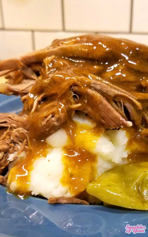 An easy peasy gravy makes a silky, scrumptious, and divine addition to this fork tender Mississippi Pot Roast recipe that broke the internet. Hits it out of the park every time! A few squeezes with the tongs, and this roast literally falls apart.