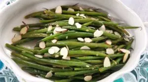 French Green Beans with Almonds Recipe - French Green Beans that are buttery and nutty, with a hint of lemon and garlic for some extra tasty goodness!
