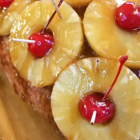 A simple and delicious centerpiece to any holiday spread. This glazed holiday ham is everything about why family traditions are so important!