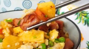 This Pineapple Fried Rice brightened our day with yummy sweet pineapple, salty ham, and all of the fresh veggies coming together to be downright deliciousness!