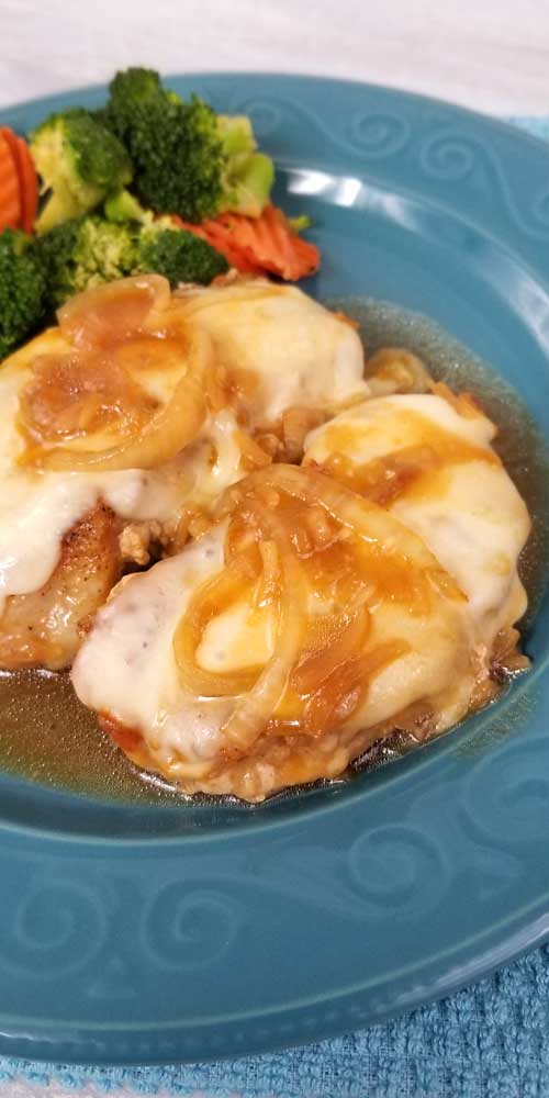 This recipe for French Onion Pork Chops is a keeper! Served right from the skillet in under 30 minutes, it doesn't get any easier. The chops come out tender and juicy, smothered in onion gravy and cheesy goodness! And the clean-up is a breeze too!