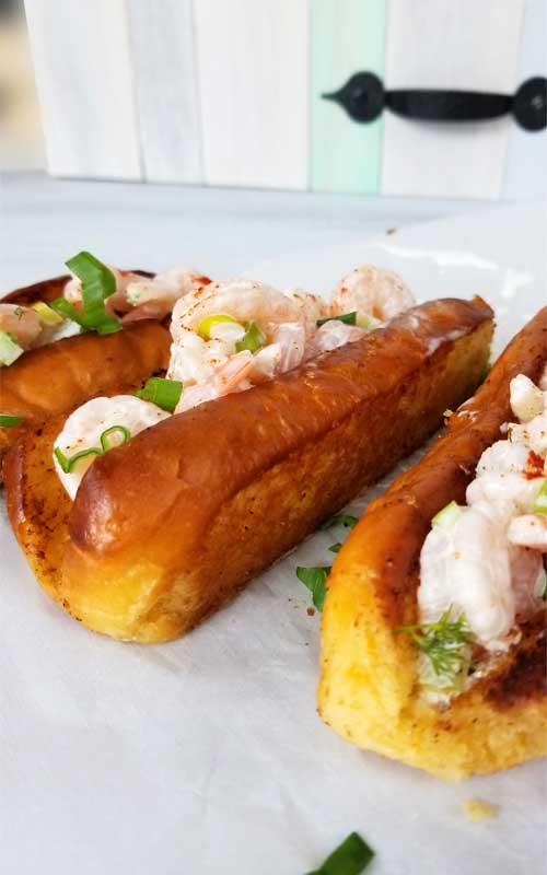 Sweet shrimp slathered in a lemon dill mayo sauce, all jammed into a potato roll. It's like taking your taste buds on a trip to a New England beach, all without leaving town. 