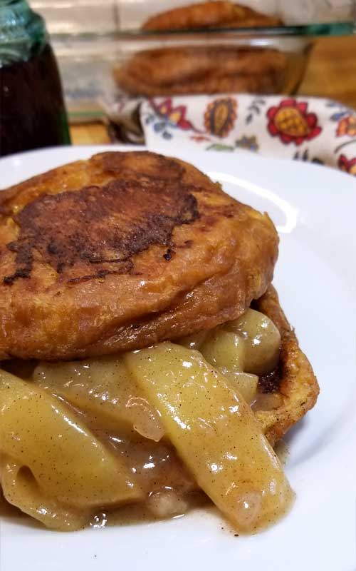 Decadently delicious Apple Pie Croissant French Toast, is pure buttery goodness filled with tender fried cinnamon apples, perfect for a fall brunch or special holiday breakfast.