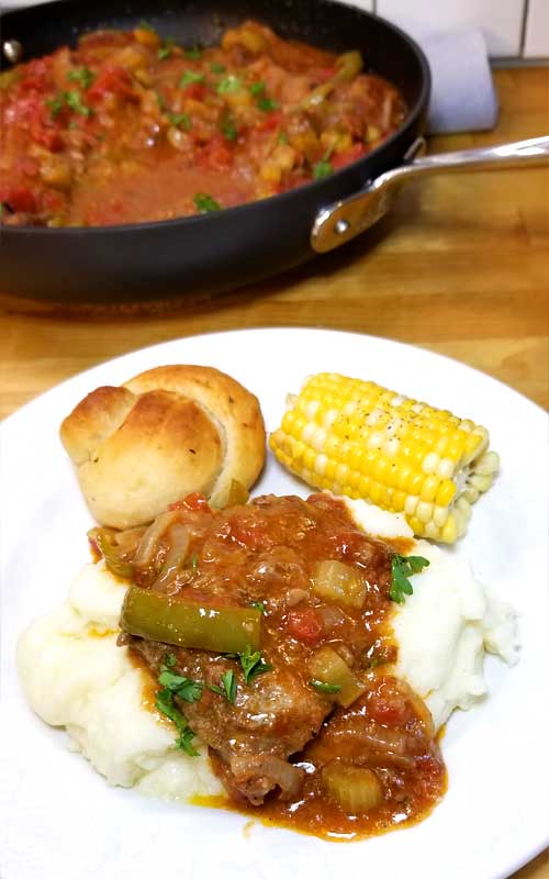 Swiss Steak is so tender and delicious, it comes together quick and is classic comfort food loved by all. However: Swiss Steak does not stem from Switzerland, as the name suggests, but from the technique of tenderizing by pounding or rolling, called "swissing".