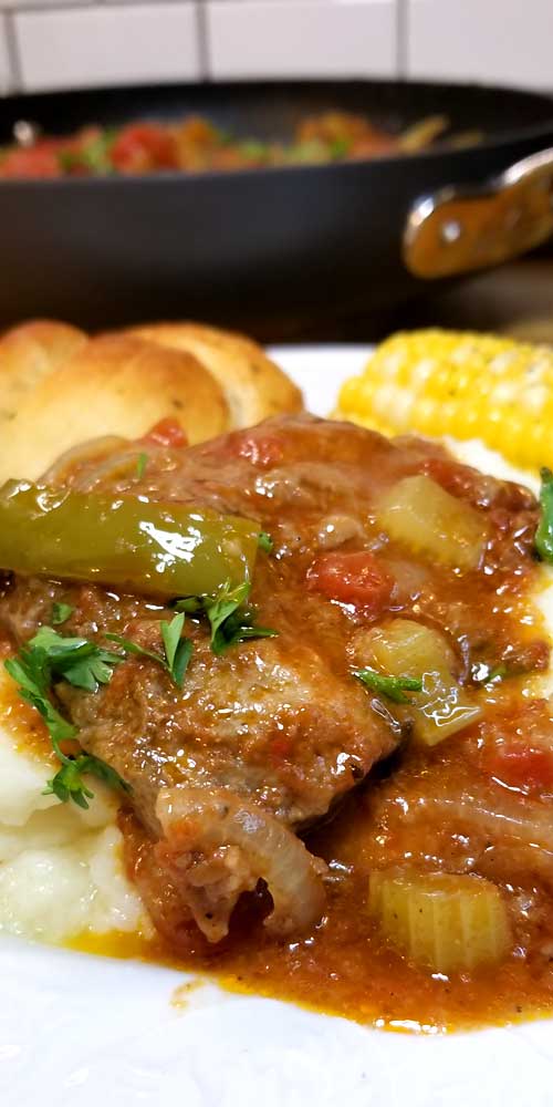 Swiss Steak is so tender and delicious, it comes together quick and is classic comfort food loved by all. However: Swiss Steak does not stem from Switzerland, as the name suggests, but from the technique of tenderizing by pounding or rolling, called "swissing".