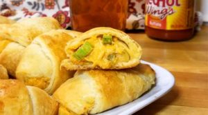 If your a fan of Buffalo Chicken, your going to fall in love with these little Beer Cheese Buffalo Bites wrapped in warm buttery crescent rolls!