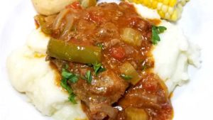 Swiss Steak is so tender and delicious, it comes together quick and is classic comfort food loved by all. However: Swiss Steak does not stem from Switzerland, as the name suggests, but from the technique of tenderizing by pounding or rolling, called "swissing".