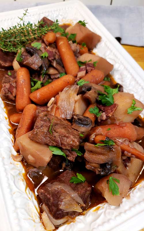 No knife needed, spoon tender, and so much flavor. You can't go wrong with this Instant Pot Beef Bourguignon, and it's EASY.