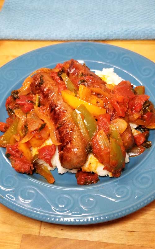 Quick, easy and delicious one skillet dinner! This recipe for Italian Sausage Peppers and Onions is so versatile. You can have it over mashed potatoes, pasta, polenta, cauliflower rice, or as an Italian sub sandwich.