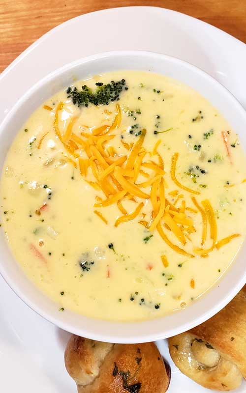 So quick to make and full of creamy cheesy goodness. Plus, this Copycat Panera Broccoli Cheddar Soup is so warm and comforting for the whole family, you may be asked to make it over and over again!