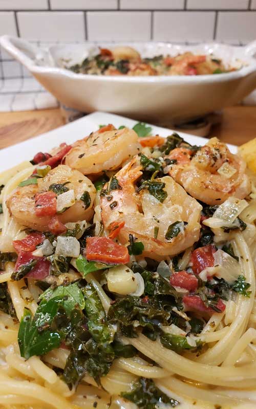 Need a super simple, quick, Chef's quality dinner for a busy day to serve your guests? You can have this Garlic Butter Tuscan Shrimp in Creamy Wine Sauce on the table in under 30 minutes and it's packed with my favorite Italian flavors!