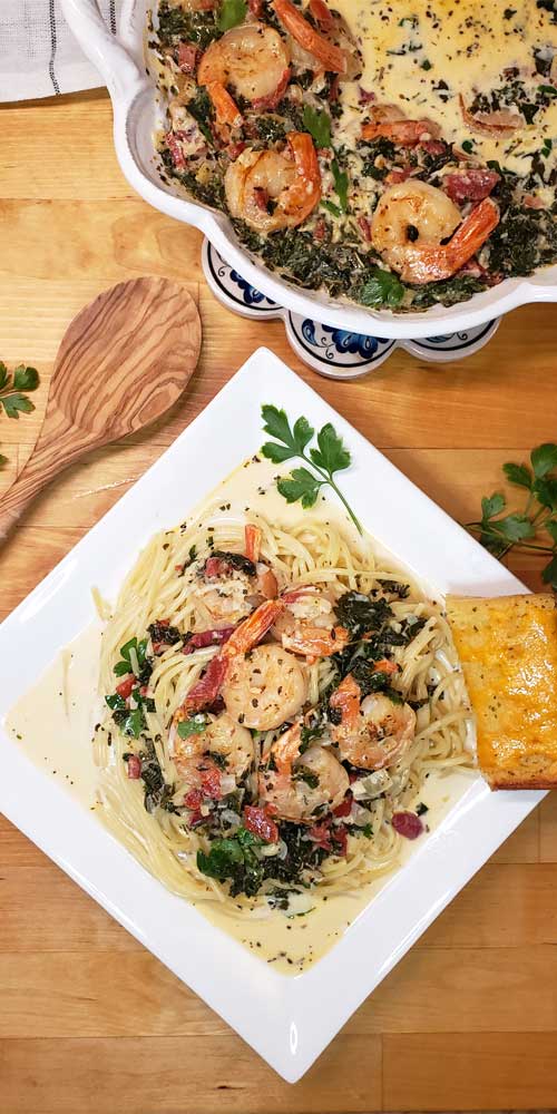 Need a super simple, quick, Chef's quality dinner for a busy day to serve your guests? You can have this Garlic Butter Tuscan Shrimp in Creamy Wine Sauce on the table in under 30 minutes and it's packed with my favorite Italian flavors!