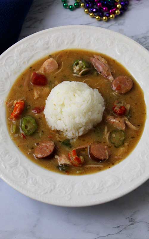Lawd have mercy, this Authentic New Orleans Cajun Gumbo is unbelievably delicious, thick, rich and full of Cajun flavor!