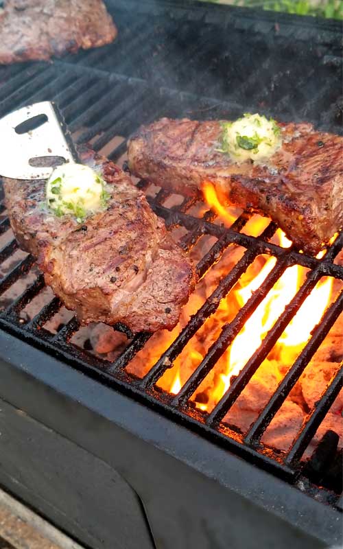 Grilled Rib Eye Steaks with Roasted Garlic Herb Butter Sparkles