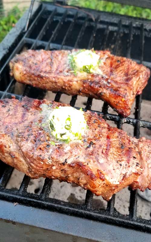 Grilled Rib Eye Steaks With Roasted Garlic Herb Butter Sparkles Of Yum 