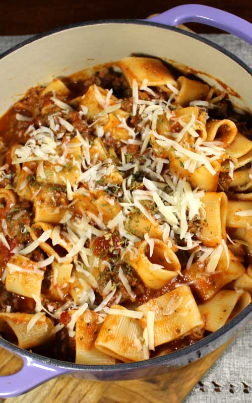 This homemade Italian Pasta and Marinara Meat Sauce will make you feel like you're pulling up a chair with generations of the great little old Italian ladies.