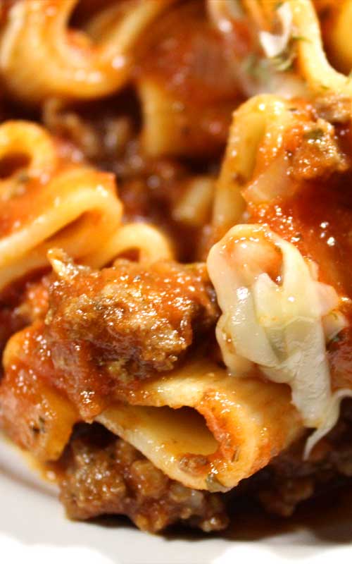 This homemade Italian Pasta and Marinara Meat Sauce will make you feel like you're pulling up a chair with generations of the great little old Italian ladies.