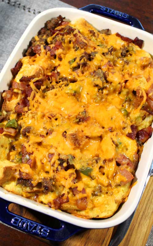 Bacon, ham, and sausage come together to make this Three Little Pigs Strata. A simple, delicious, and comforting breakfast everyone is sure to love!