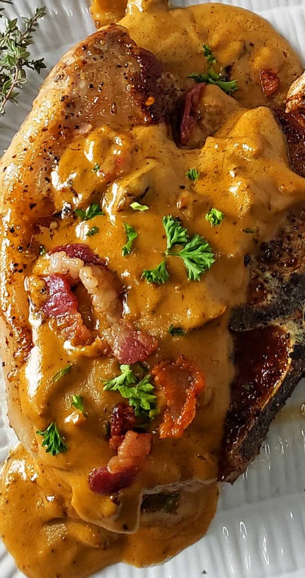 Bacon Gravy Smothered Pork Chops - Sparkles of Yum