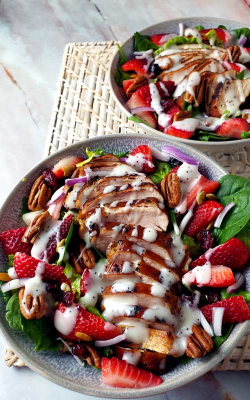 This Summer Strawberry Spinach Salad with Chicken is so tasty and refreshing for a hot day. It's simple, healthy, and incredibly delicious!