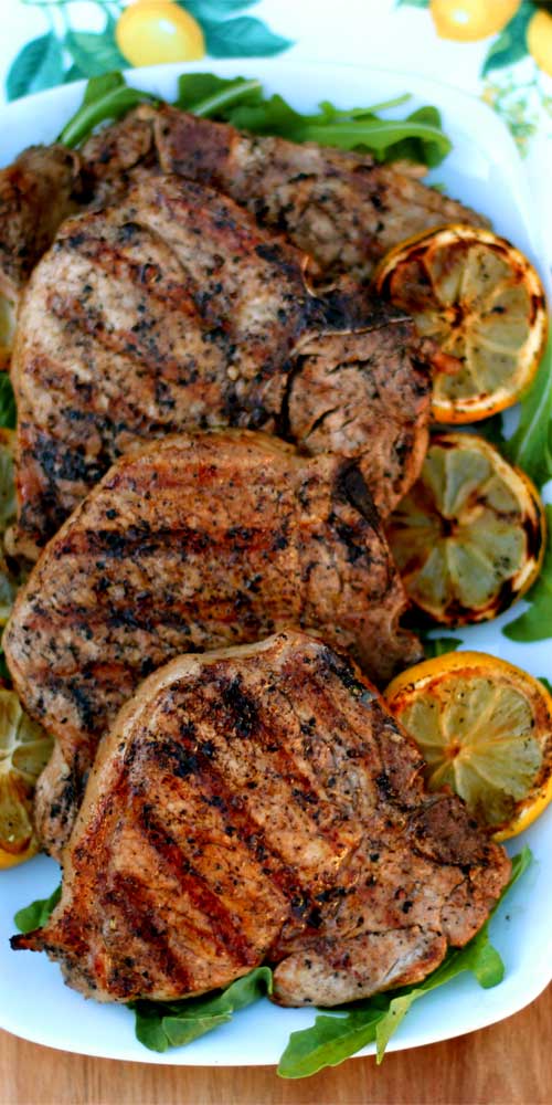 These Grilled Lemon Garlic Pork Chops were so fantastic! They were the superstar of our cookout! The lemon garlic marinade makes for the most juicy and tender chops around.