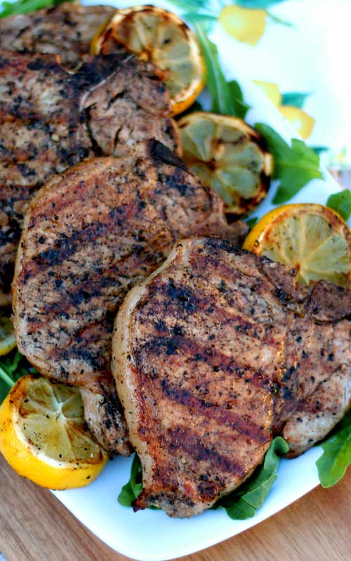These Grilled Lemon Garlic Pork Chops were so fantastic! They were the superstar of our cookout! The lemon garlic marinade makes for the most juicy and tender chops around.