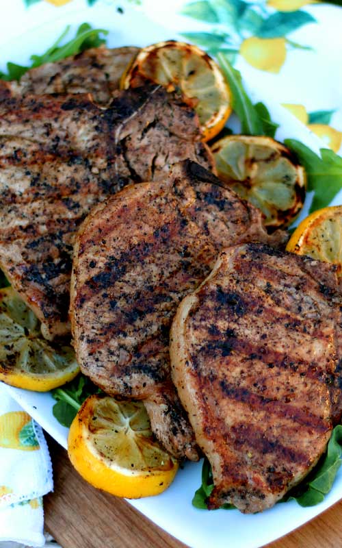 These Grilled Lemon Garlic Pork Chops were so fantastic! They were the superstar of our cookout! The lemon garlic marinade makes for the most juicy and tender chops around.