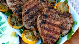 These Grilled Lemon Garlic Pork Chops were so fantastic! A the superstar of our cookout! The lemon garlic marinade makes for the most juicy and tender chops around.