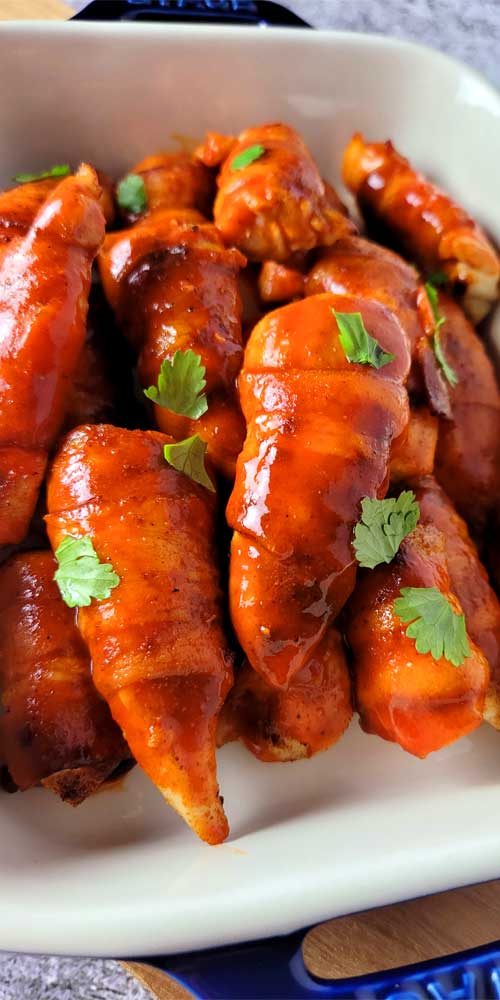 A perfectly snackable finger food, these Keto Bacon Wrapped Buffalo Chicken Tenders are perfect for any get together; be it the big game, family celebration, or even a shower.