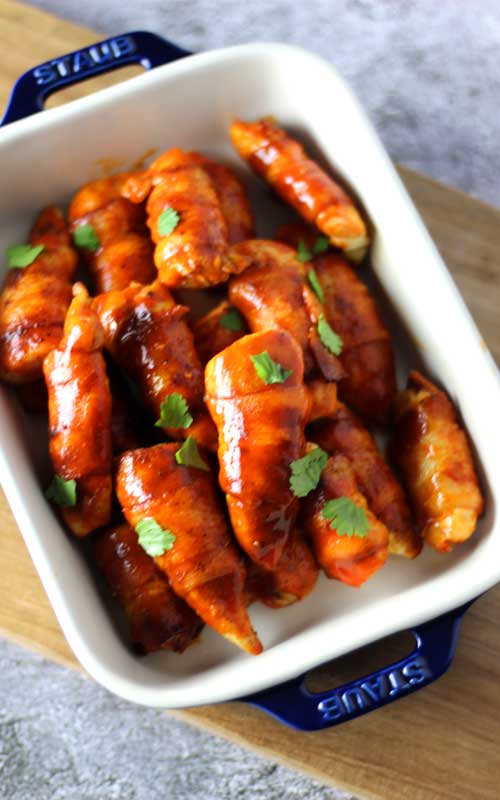 A perfectly snackable finger food, these Keto Bacon Wrapped Buffalo Chicken Tenders are perfect for any get together; be it the big game, family celebration, or even a shower.