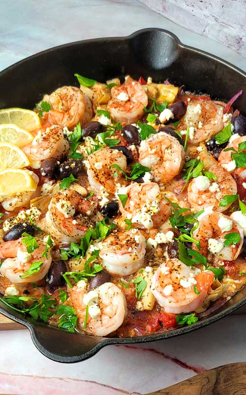 You will not believe how much flavor this Mediterranean Shrimp Skillet has. A no-guilt meal that is THIS easy to make?! Yes Please!!!